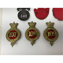 Ten cap badges of Indian interest comprising Bengal Fusiliers No.104, Bengal Infantry No.107, Royal Bengal Fusiliers No.101, Bombay Infantry No.109, Bombay L.I. No.106, two Royal Madras Fusiliers No.102, Madras Infantry No.108 and Madras L.I. No.105 (10)