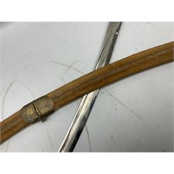 Early 20th century Indian ebonised sword stick, the 59.5cm blade with punched decoration and horn grip L94cm overall; and a reproduction Indian tulwar with scabbard (2)