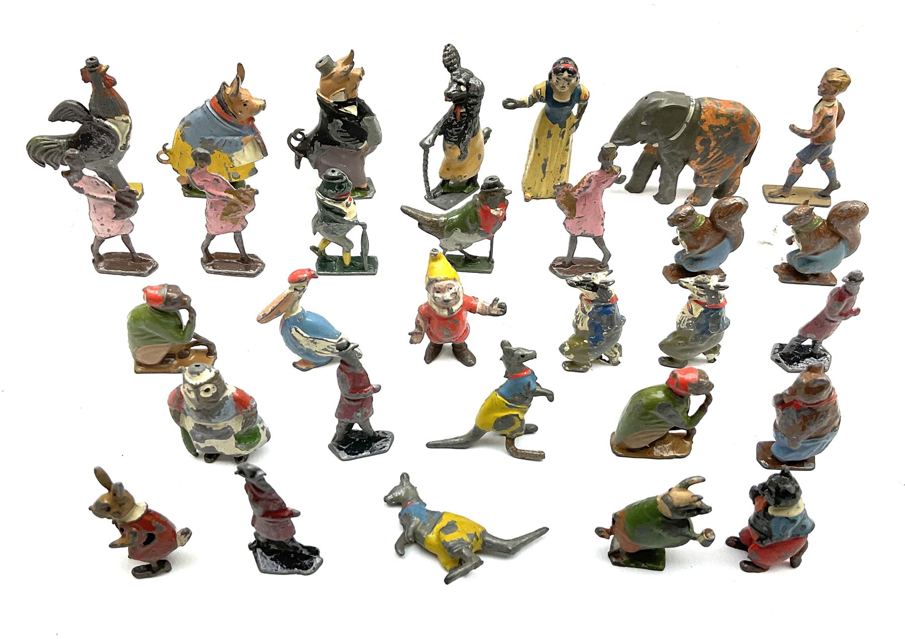 Collection of twenty-two Britains Cadbury's Cococubs play worn lead painted figures to include Mr Pie Porker, Mrs Pie Porker, Tiny Tusks, Captain Kangaroo, Granny Owl and others, Britains Snow White and Doc lead figures and other painted lead figures (30)
