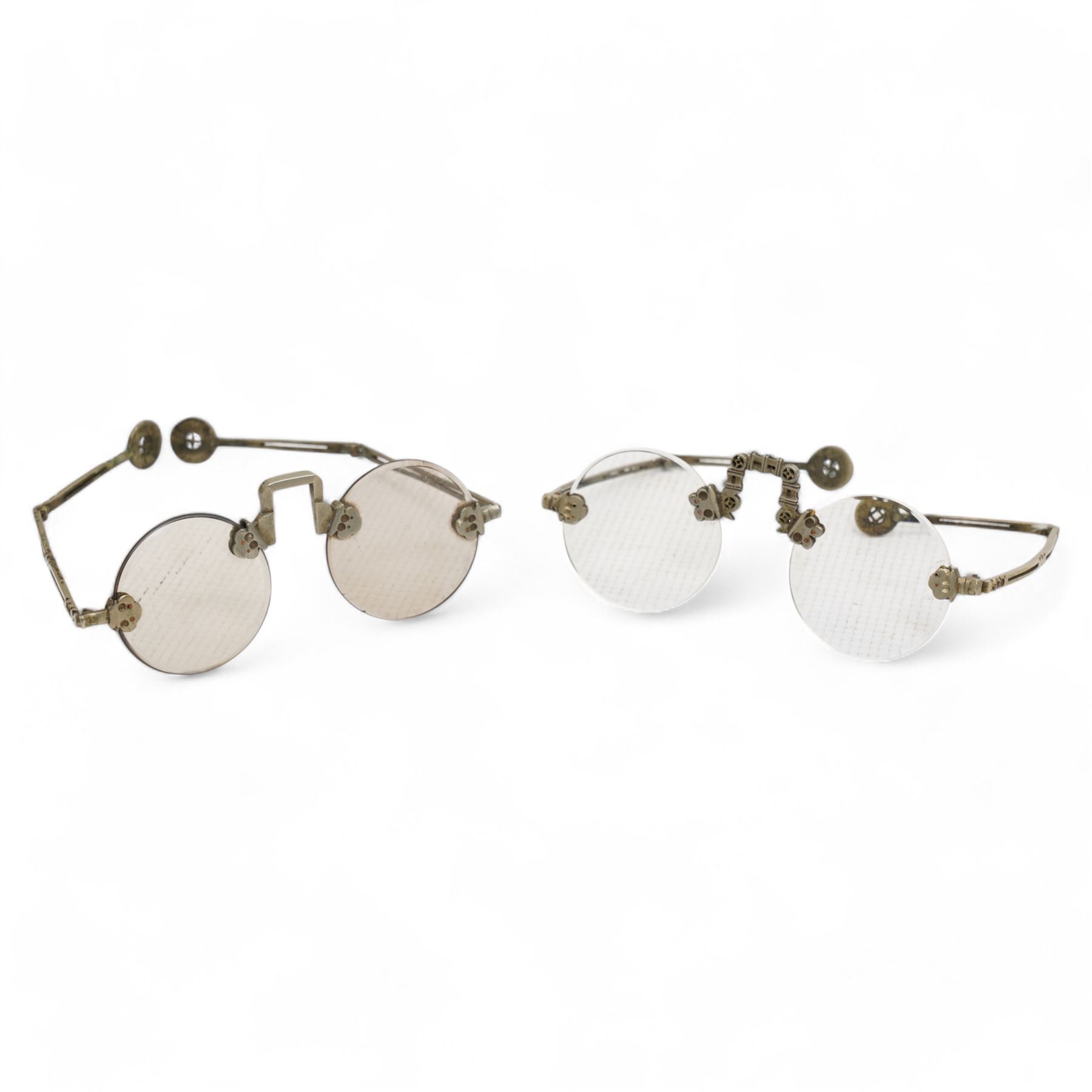 Two 19th century Chinese shagreen spectacle cases each containing a pair of nickel framed spectacles
