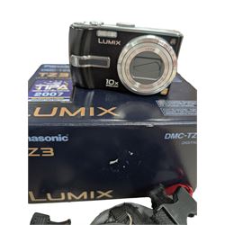Two compact digital cameras, comprising Panasonic Lumix DMC-TZ3 digital camera, with Leica DC Vario Elmar 1:3.3-4.9/4.6-46 ASPH lens, with carry case, battery, charger, instructions and box and Canon Ixus 400 with carry case and instructions, Manfrotto Professional Tripod and a Benbo monopod