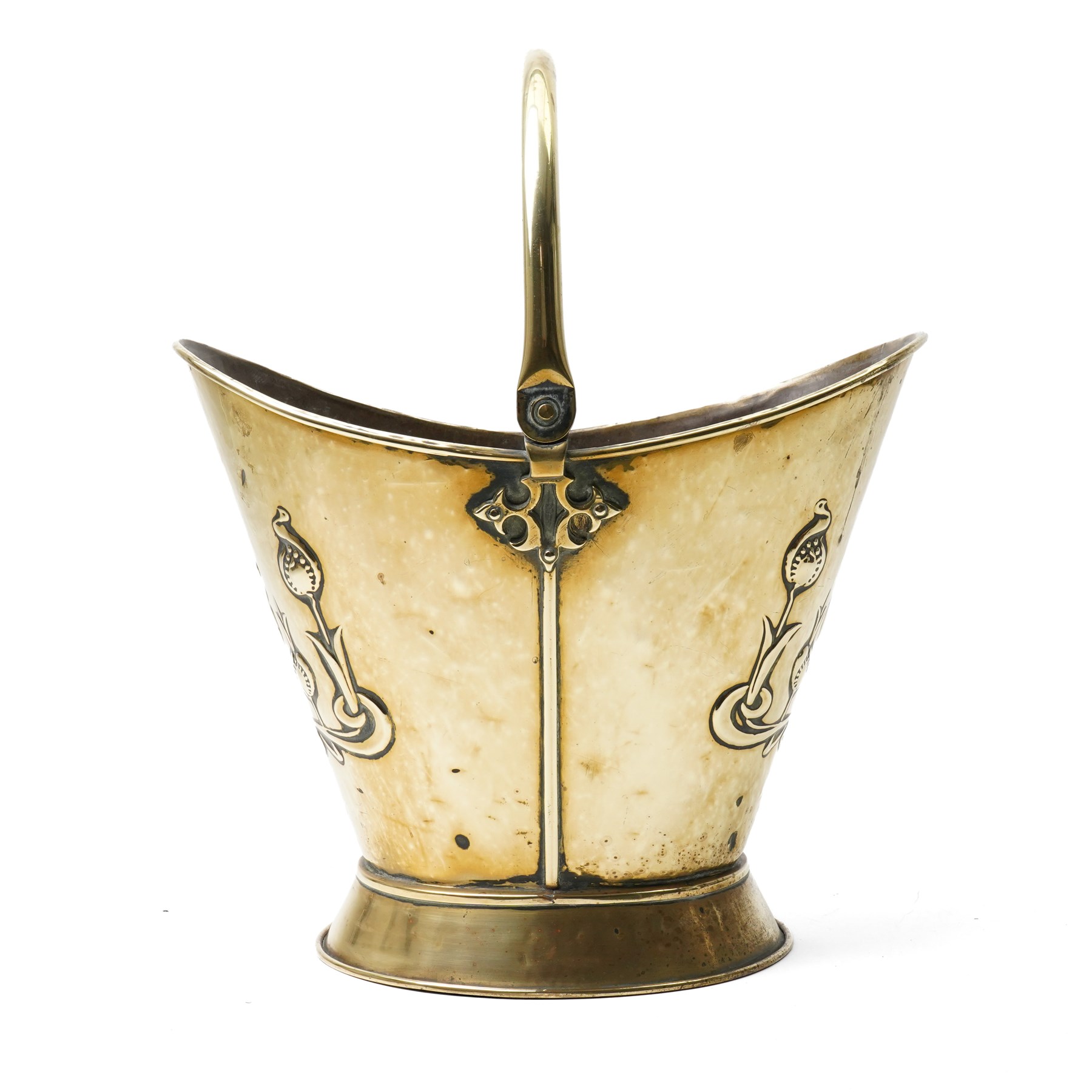 Art Nouveau brass log bucket of oval design with swing handle and a raised pattern of stylised flowers H29cm