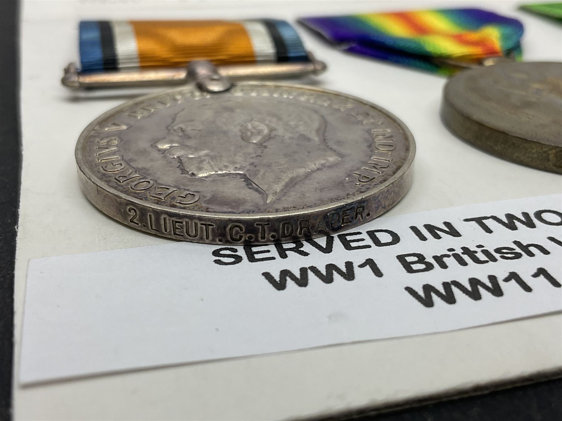 WWI pair of medals comprising British War Medal and Victory Medal awarded to 2nd Lieutenant C.T. Draper; and WWII Defence Medal awarded to Captain C.T. Draper with War Office letter of confirmation; all with ribbons (3)