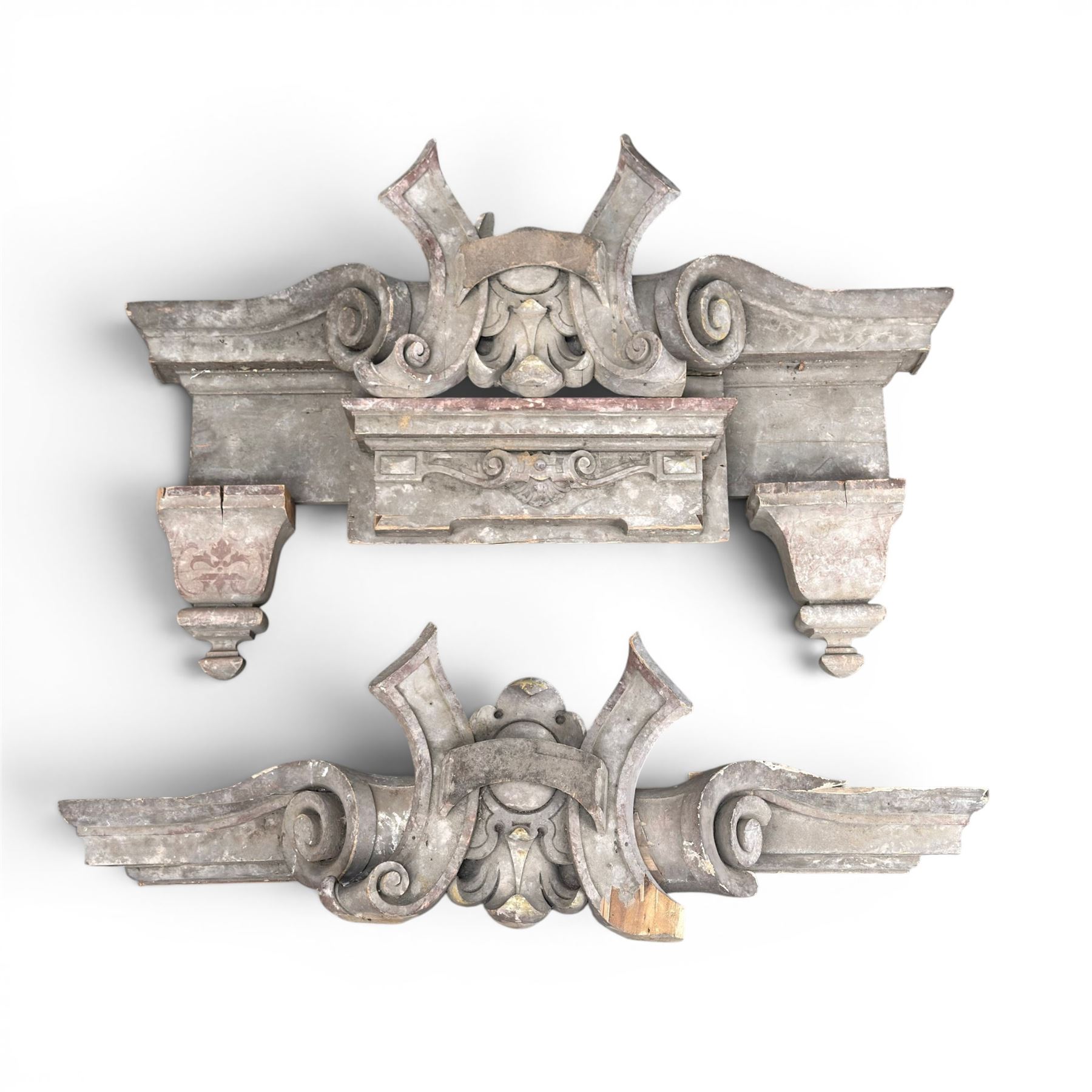Two 19th century painted pine architectural pediments, one mostly compete with cappings
