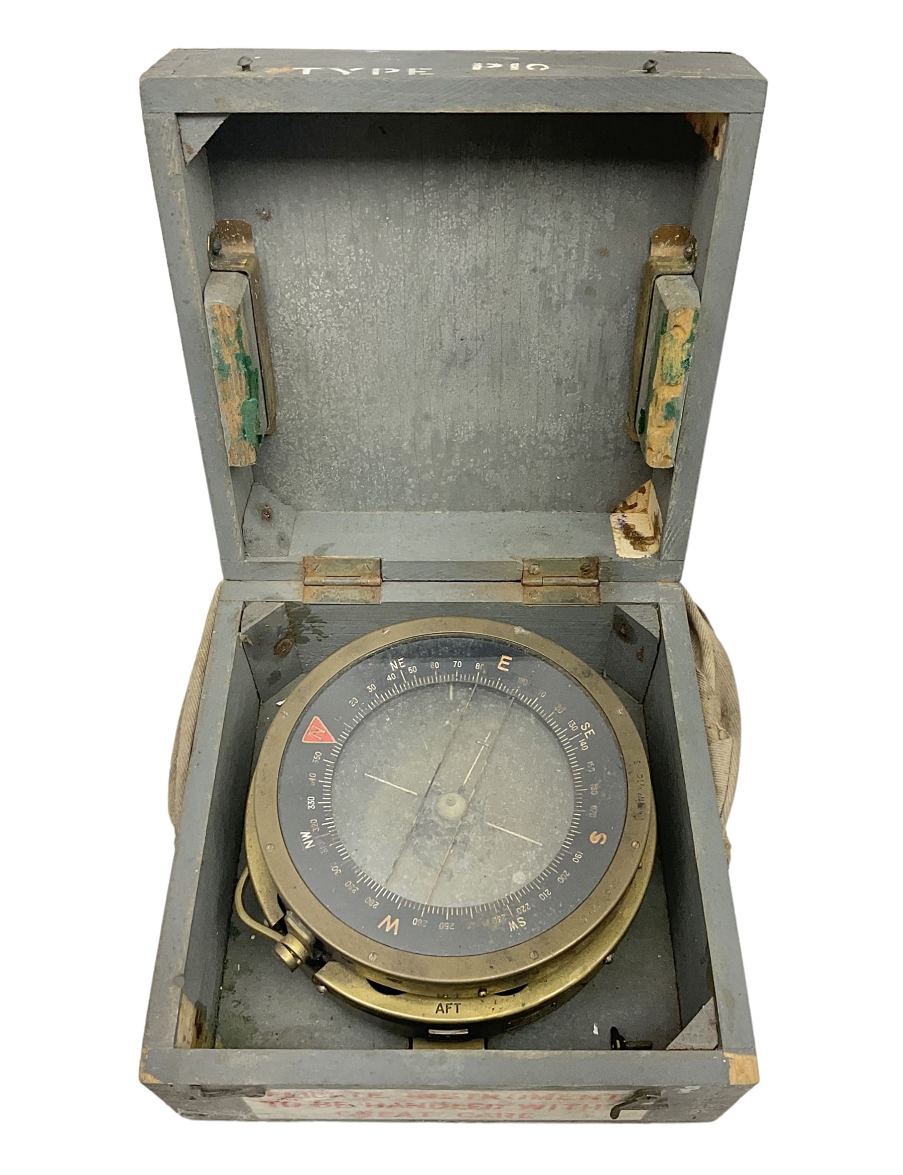  WWII period Type P10 aircraft compass, 16.5cm diameter brass rim marked “Type P10” and “No 1130B”, spring mounted onto brass base with Air Ministry plate marked “Crown A.M. No 6A.1671”; in original grey painted wooden box