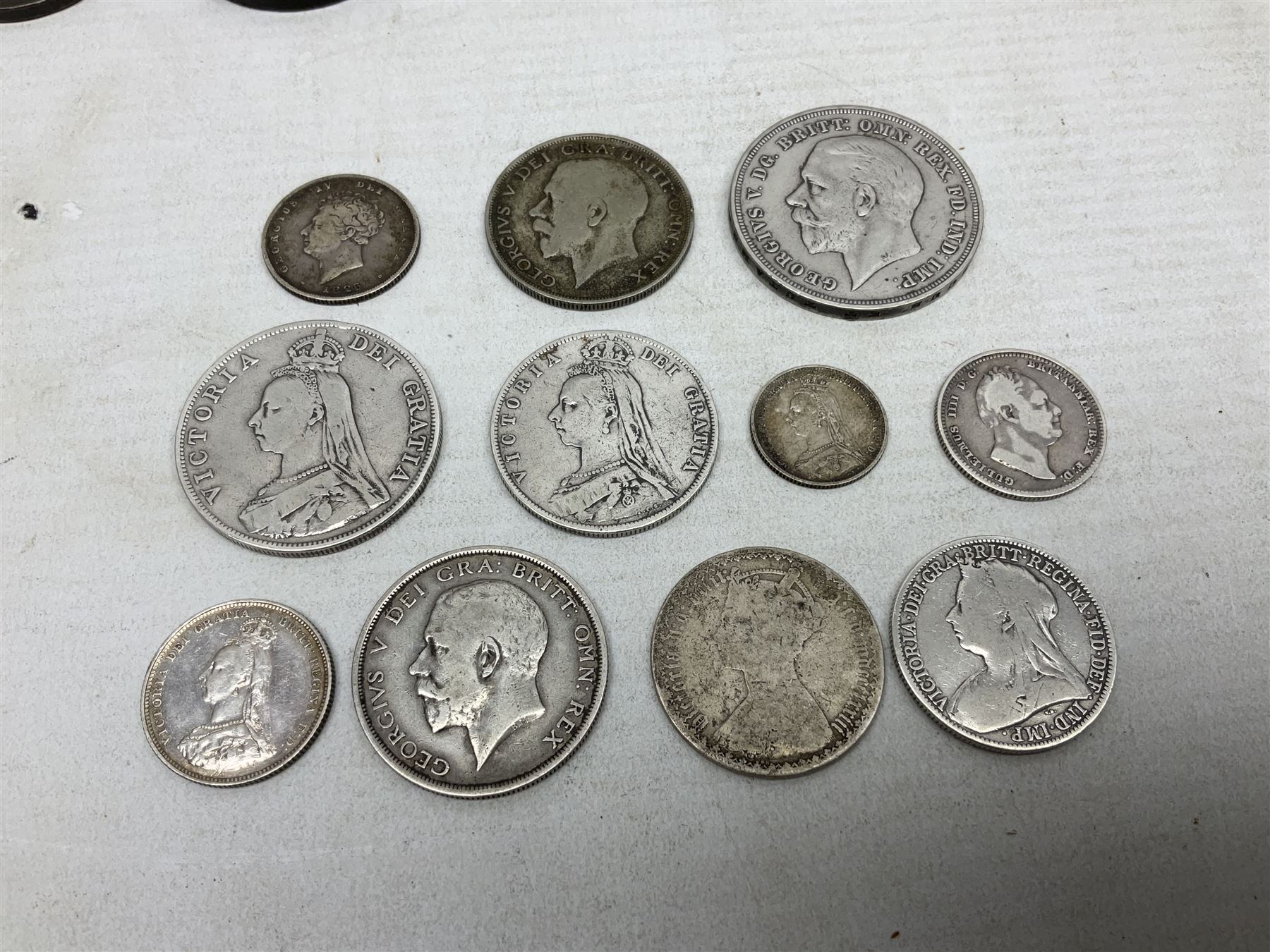 Approximately 90 grams of pre 1920 Great British silver coins, approximately 120 grams of pre 1947 Great British silver coins, George III cartwheel penny and twopence and George IV Irish 1823 penny 