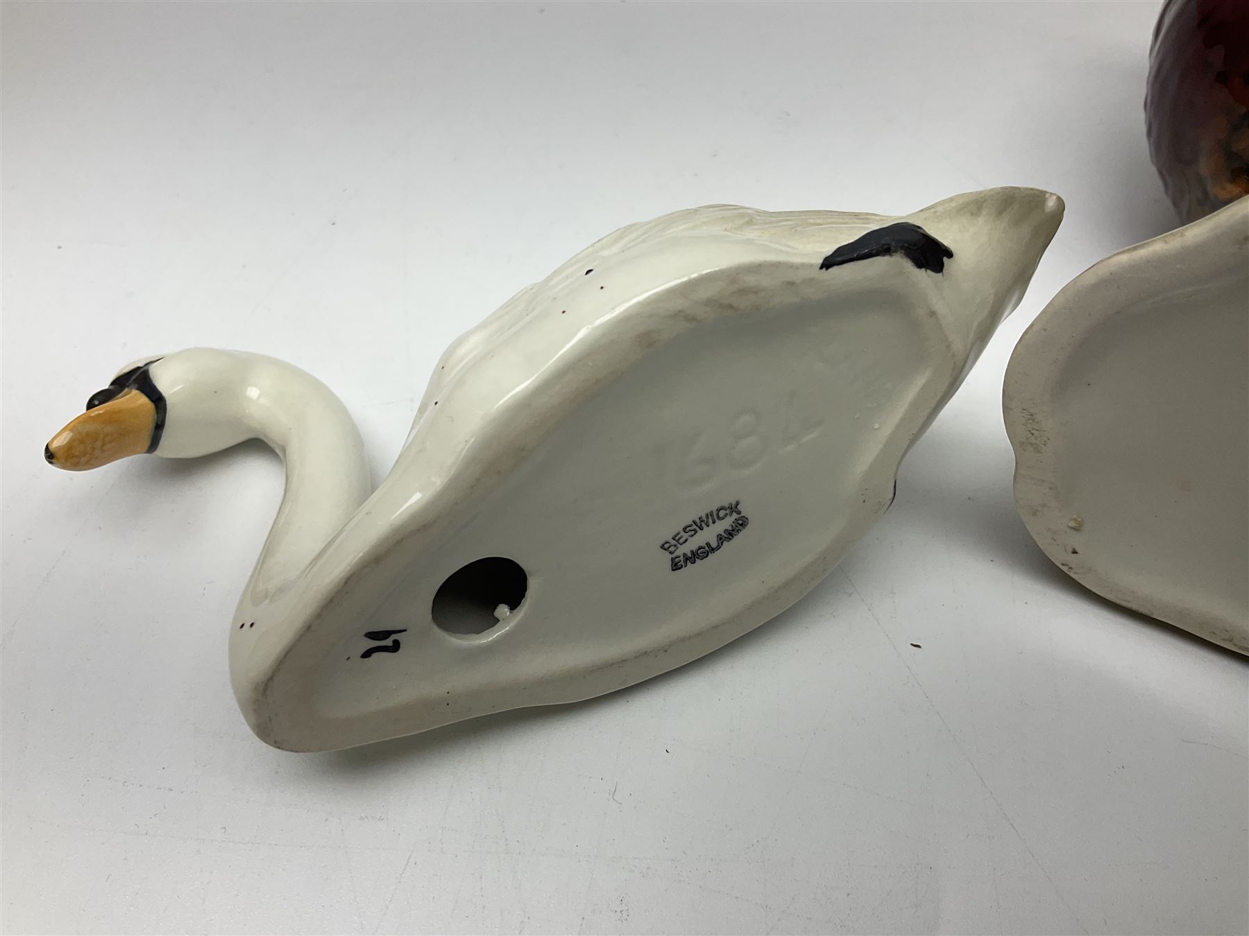 Group of Beswick figures to include leopard no 1082, rabbits, swan, pheasant no 1226 etc, all with marks beneath