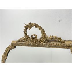 19th century giltwood and gesso overmantel mirror, pediment set with open laurel leaf wreath, egg and dart frame with outer bead and moulded inner slip, the top corners arched and canted, scrolled lower brackets 