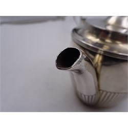 1930s American silver three piece batchelors tea service, comprising teapot, twin handled open sucrier and milk jug, each of part fluted oval form, the teapot with personal engraving to body, wood effect handle and silver urn shaped finial, stamped sterling with maker's mark for Gorham, teapot H13cm