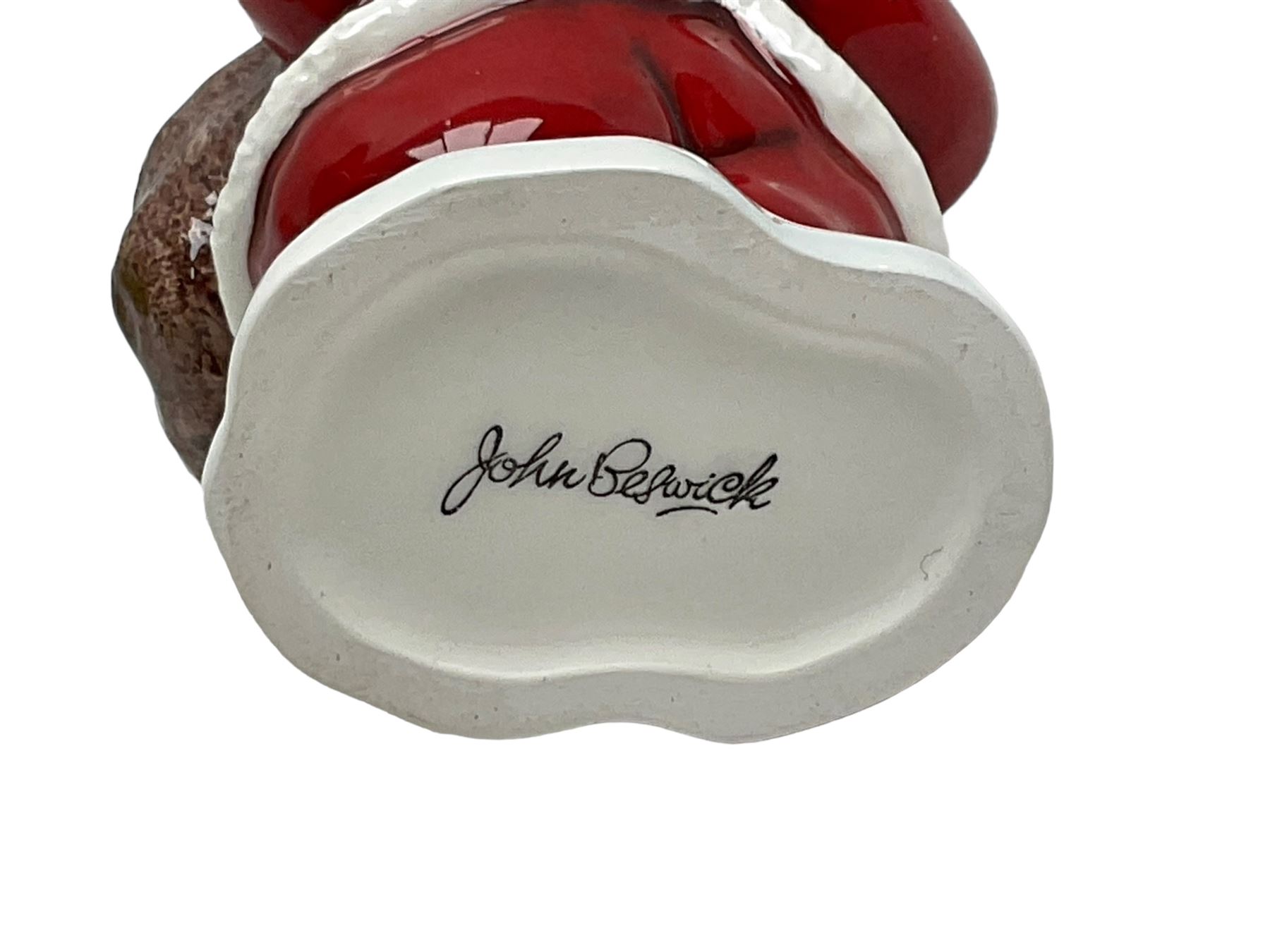 Two Beswick figures, composing The Snowman and Father Christmas, together with Border Fine Arts Enamel dish depicting a scene from The Snowman A3995, all in original boxes 