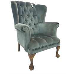 Georgian design wingback armchair, traditional shape with rolled arms, upholstered in teal velvet fabric, on cabriole supports with ball and claw feet