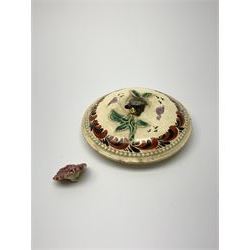 18th century creamware teapot, probably Leeds, with reeded entwined handle and floral finial to the cover, the body with hand painted polychrome decoration of figure to one side, and floral spray to the other, collectors paper label beneath inscribed Leeds Pottery, H11.5cm