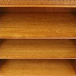 Contemporary mahogany and yew wood open bookcase, dentil cornice above two adjustable shelves, shaped apron and bracket feet 