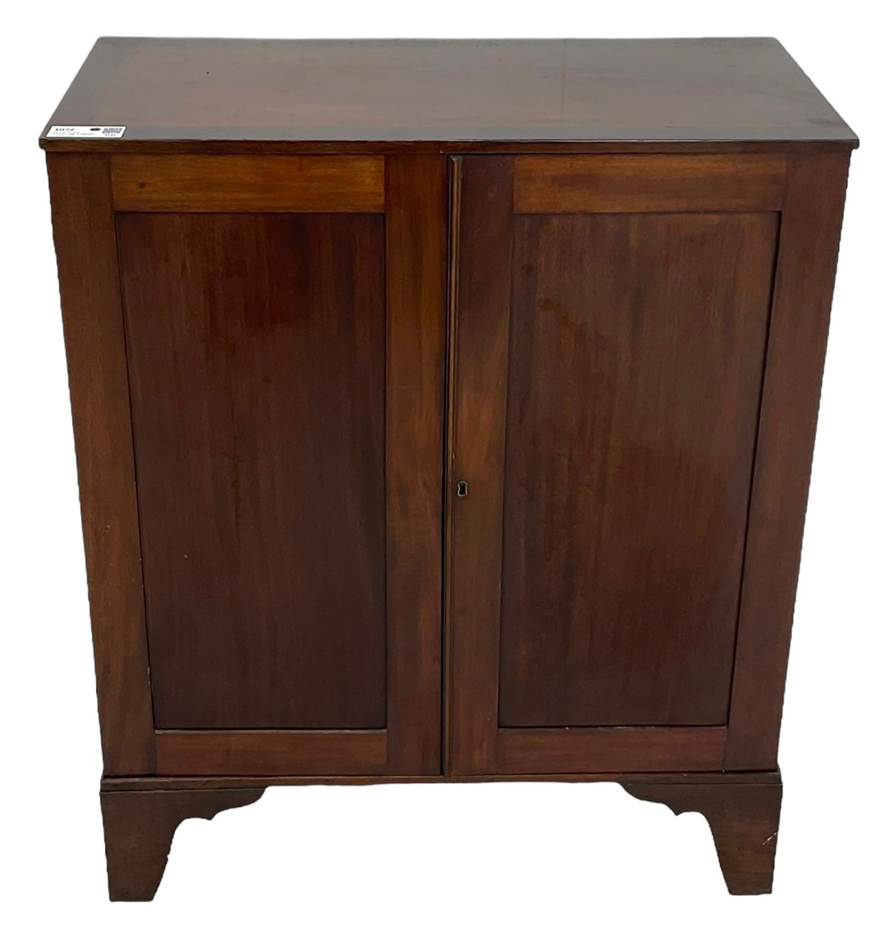 19th century mahogany collector's cabinet, crossbanded rectangular top over two panelled doors, the interior fitted with seven shallow drawers, on bracket feet