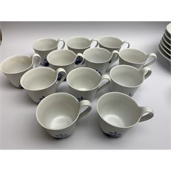 Royal Copenhagen tea and dinner service for twelve place settings, decorated in the Mega Blue Fluted pattern, pattern number 622, comprising dinner plates, salad plates, bowls with pierced rim, smaller bowls, tea cups, and saucers, dinner plates D27.5cm, salad plates D22cm