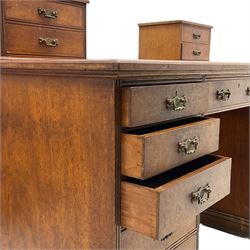 C. Hindley & Sons (London: 1820-1892) - Late Victorian walnut twin pedestal desk, the rectangular moulded top surmounted by two banks of two drawers over eleven graduating drawers, on moulded plinth base, the central drawer stamped 'C. Hindley & Sons, 134 Oxford Street, London, 5298'