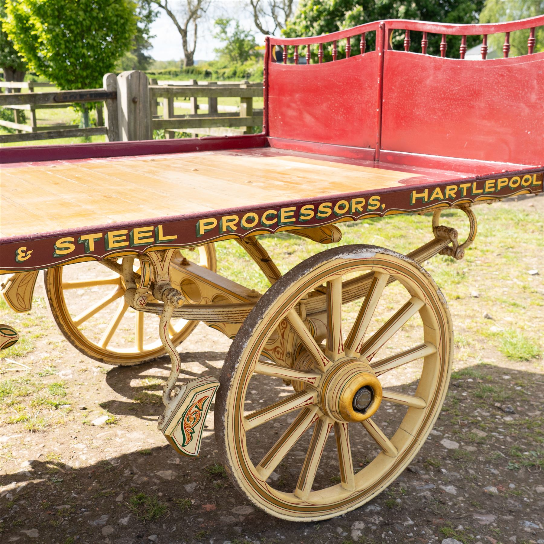 Advertising Trade Dray Wagon for C. Herring & Son, Hartlepool, Dated 1895 and Renovated 1975

An exceptionally decorative late Victorian horse drawn advertising trade dray, built by J. Herring of Hartlepool in 1895 and later renovated by C. Herring in 1975, as recorded by the painted inscription beneath the body. Finished in a striking cream and maroon livery with extensive hand painted signwriting, the wagon carries the name C. Herring & Son, Iron & Steel Processors, Hartlepool along its sides and rear panels. The wagon is fitted with a flat timber loading bed, twin shafts for a single horse, elegant spoked wooden wheels, iron bound tyres, rear headboard and traditional undercarriage with leaf spring suspension. Richly detailed scrollwork and lining throughout make this a particularly attractive example, suitable for collection, display, museum, promotional or coaching purposes.

Features

• Built by J. Herring, Hartlepool, 1895
• Renovated by C. Herring in 1975
• Original style hand painted advertising signwriting
• Flat timber loading platform
• Raised rear headboard with decorative pierced gallery
• Twin shafts for a single horse
• Wooden spoked wheels with iron tyres
• Traditional leaf spring suspension
• Extensive decorative lining and scrollwork throughout
• Attractive cream and maroon colour scheme
• Suitable for private collection, museum or display use

Dimensions:
Overall length: 560 cm
Body length: 300 cm
Width: 158 cm
Height: 150 cm

Wheel Diameters:
Front wheels: 76 cm
Rear wheels: 86 cm
