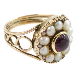 George III 9ct rose gold garnet and pearl mourning ring, single cabochon garnet, with split and seed pearl surround and pierced design shoulders, the back inscribed and dated 1808