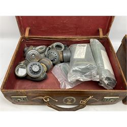Early 20th century leather suitcase marked to the top 'Major P.M. Newton R.E. Crossways, Bridlington, East Yorkshire' 60 x 40cm; another similar leather suitcase marked W.D. to the lid; three post-WW2 respirators; and three unopened pairs of British Army N.B.C. (Nuclear Biological Chemical) No.1 Mk.III Trousers Protective (8)