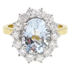 18ct gold oval aquamarine and round brilliant cut diamond cluster ring, hallmarked, aquamarine approx 2.50 carat, total diamond weight approx 0.90 carat