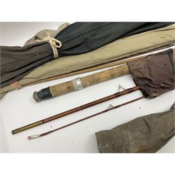 Four various fishing rods with reels and floats; and 1950s Slazenger long bow with two arrows