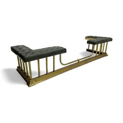 Victorian design brass telescopic extending club fire fender, the corner seats upholstered in buttoned green fabric over plain balustrade, on moulded base with floral cast corner brackets 