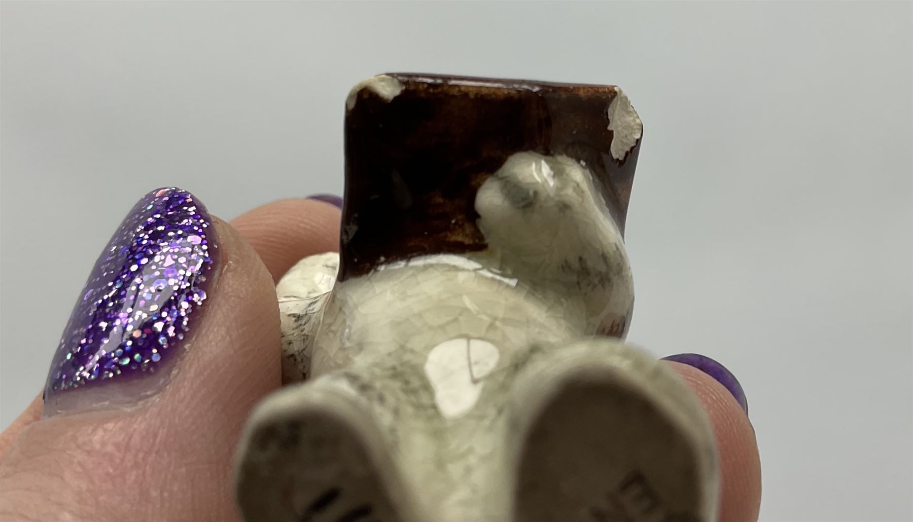 Victorian Wedgwood blue jasperware jardiniere H16.5cm; Victorian copper lustre jug; James Kent art deco style green glazed jug; and Beswick figure of a singing cat (4)