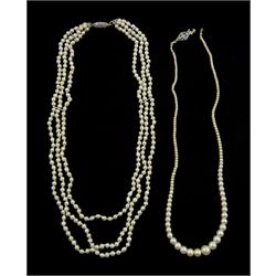 Three strand pearl necklace, with platinum diamond milgrain clasp and a single strand graduating pearl necklace with 18ct white gold clasp set with a diamond