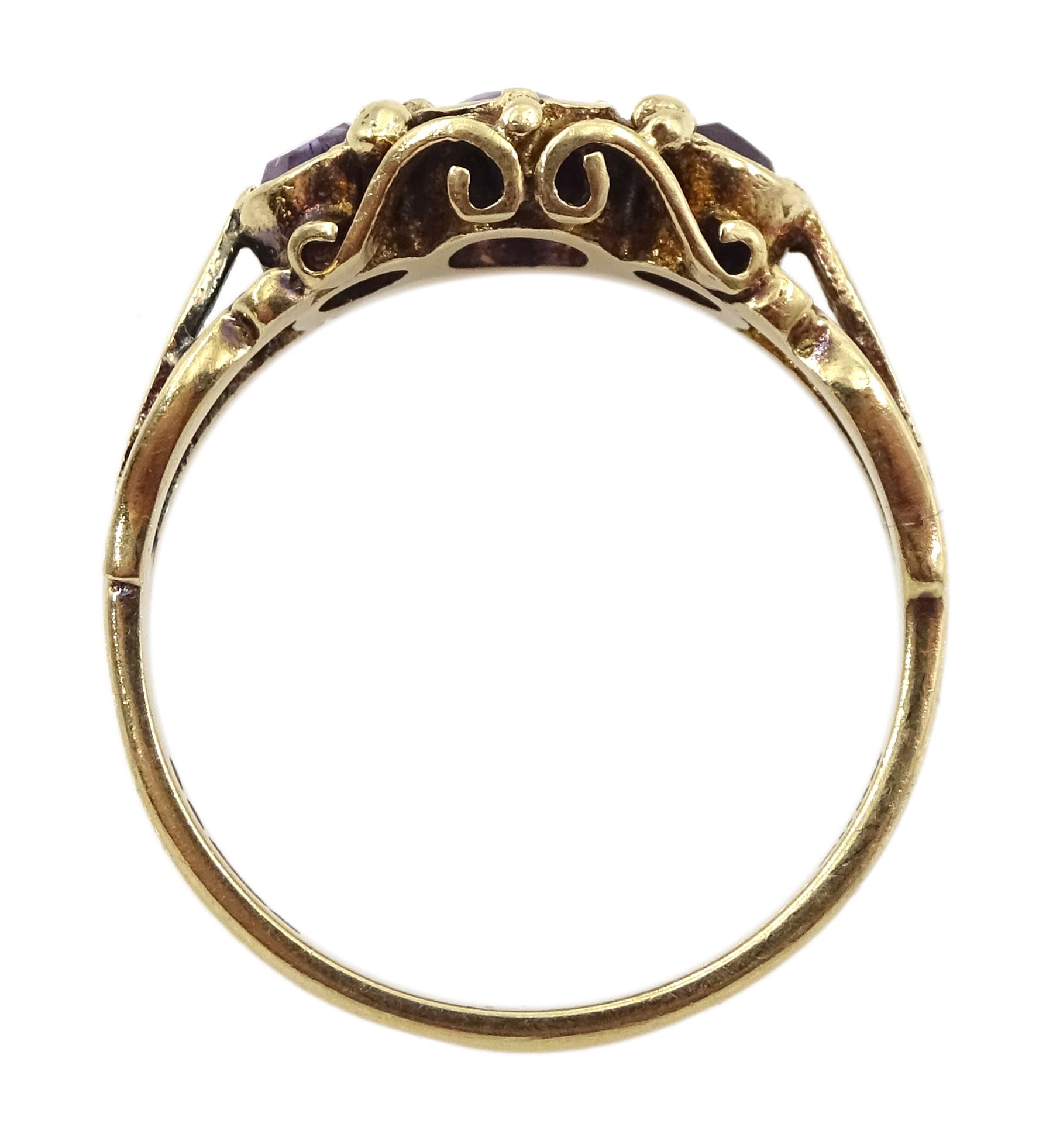 Gold amethyst pendant, stamped 18K, on 9ct gold chain necklace and a 9ct gold three stone amethyst ring, hallmarked