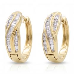 Pair of 14ct gold diamond crossover hoop earrings, each set with tapered baguette and roun...