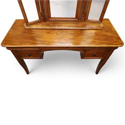Willis & Gambier - mahogany dressing table, three part mirror and stool, the dressing table with rectangular top with chamfered corners, over two baize lined frieze drawers, kneehole recess and a single drawer either side, three part mirror with central tilting mirror on a moulded plinth base, with oval beige padded stool 