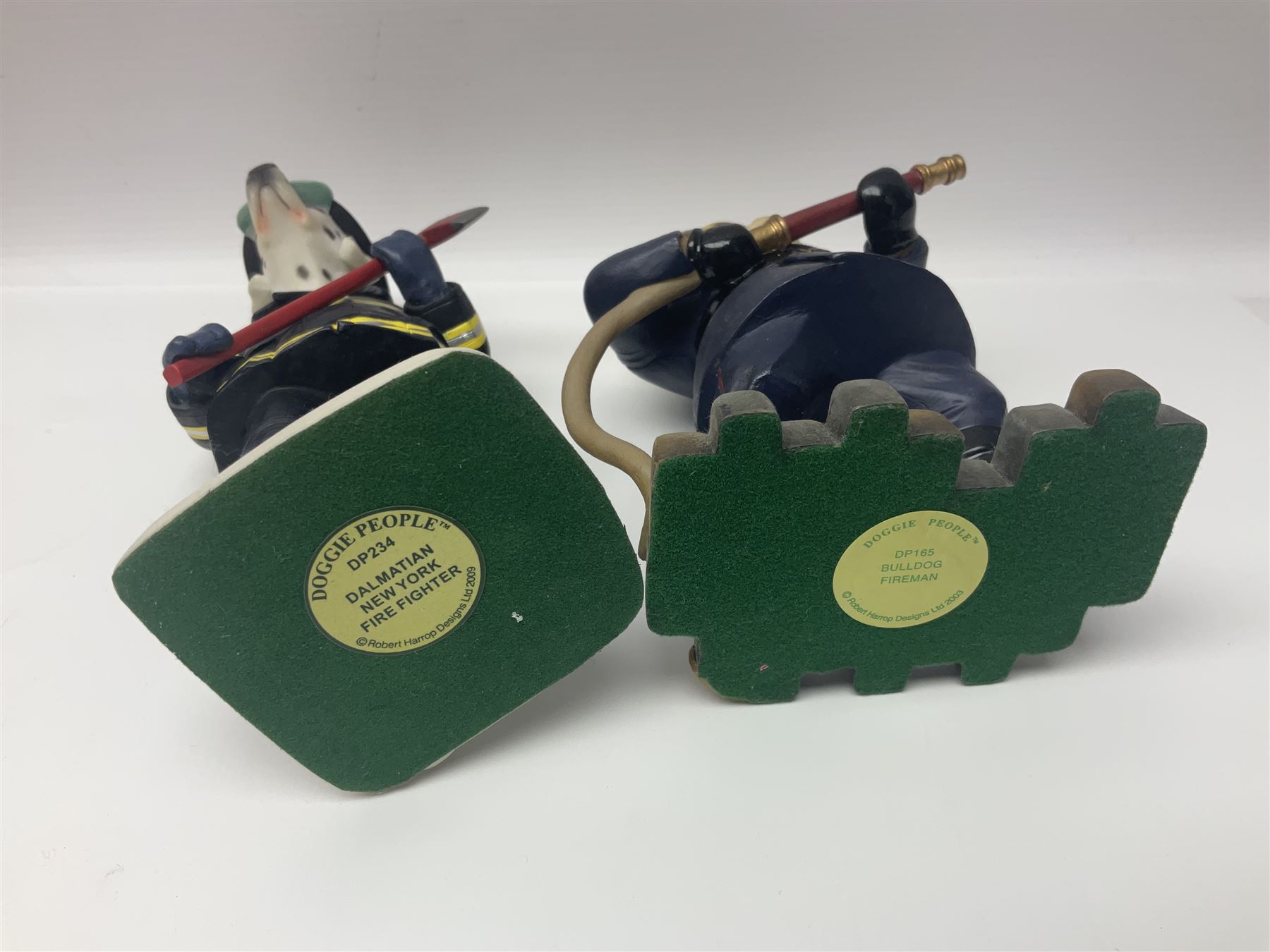 Eleven Robert Harrop figures from various collections, comprising limited edition The Trumpton Fire Engine Musical Box CGMB8 no. 359/1000, The Dragon from the Red Knight BN09, Bulldog Fireman DP165, Pointer Fire Chief DP184, Dalmatian New York Fire Fighter DP234, Dalmatian Fire Fighter DP191; Desperate Dan ‘Fireman Dan’ BDS11, Cuthbert CG13, Pugh (Clarinet) CG70, The Soup Dragon CL05 and Baby Dragon CL06