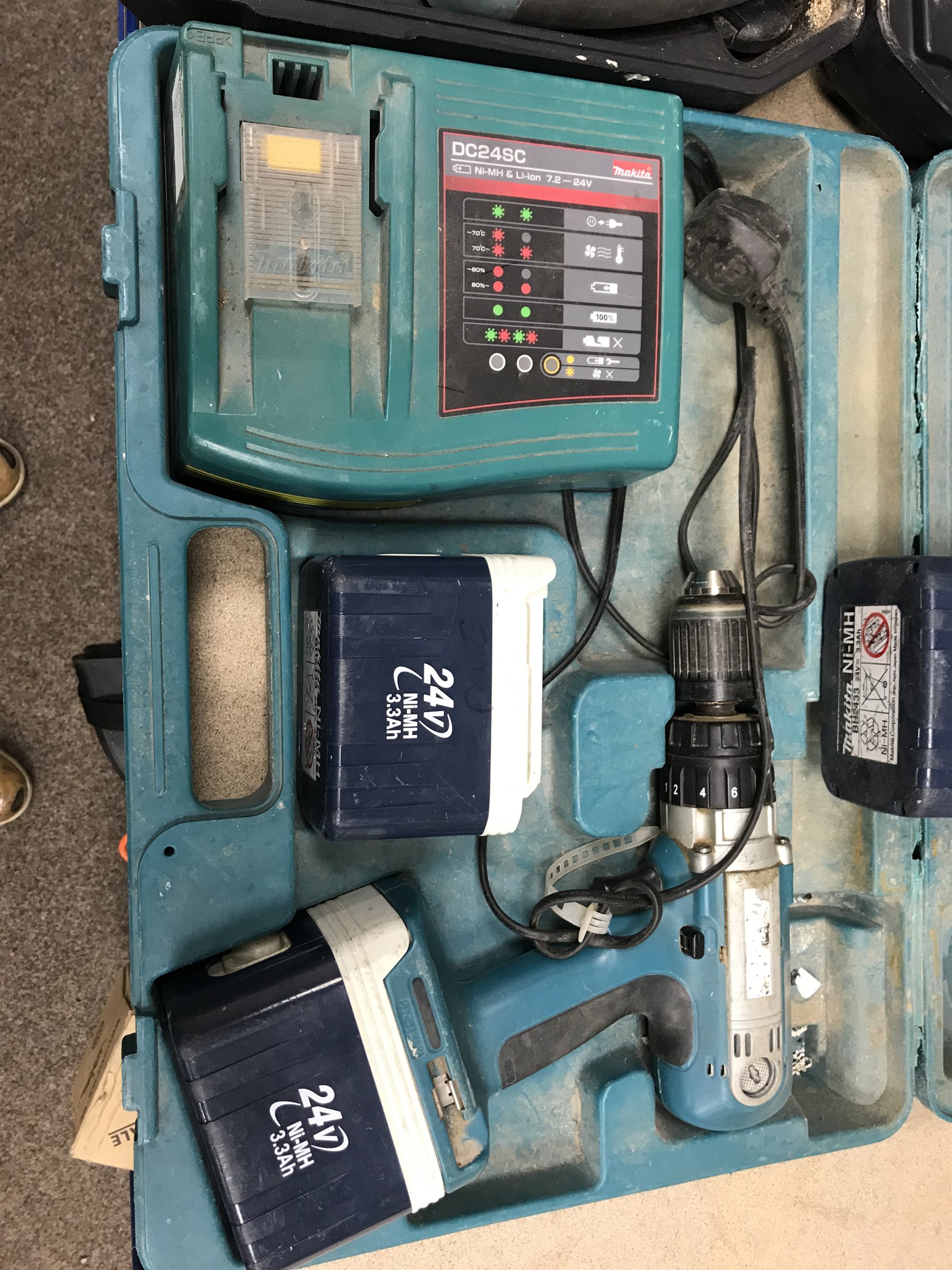 A quantity of hand tools including a Ferm FAG-230 angle grinder, a MacAllister reciprocating saw, a jig saw etc