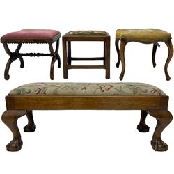 20th century mahogany rectangular footstool, needlework upholstered drop-in seat, on ball and claw carved feet (W81cm, D35cm, H34cm); 19th century elm stool, needlework upholstered drop-in seat, on square moulded supports united by plain stretchers (W45cm); 19th century walnut stool, shaped top upholstered in needlework, on cabriole supports (W50cm); 19th century rosewood stool, upholstered drop-in seat, on curved x-framed supports united by turned stretcher (W47cm)