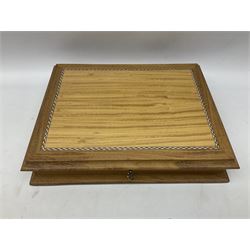 The Stamps of Royalty collection consisting of twenty-five sterling silver hallmarked stamp replicas, housed in a fitted wooden display case, with certificates, polishing cloth and certificates