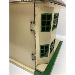 Mid-20th century Tri-ang wooden dolls house of bay-windowed form with hipped roof, the hinged tin-plate front elevation opening to reveal two partially furnished rooms L36cm H40cm D25.5cm; together with a quantity of scratch-built wooden and other dolls house furniture and accessories