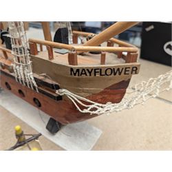 Wooden model ship 'Mayflower', together with a similar smaller example, largest H56cm