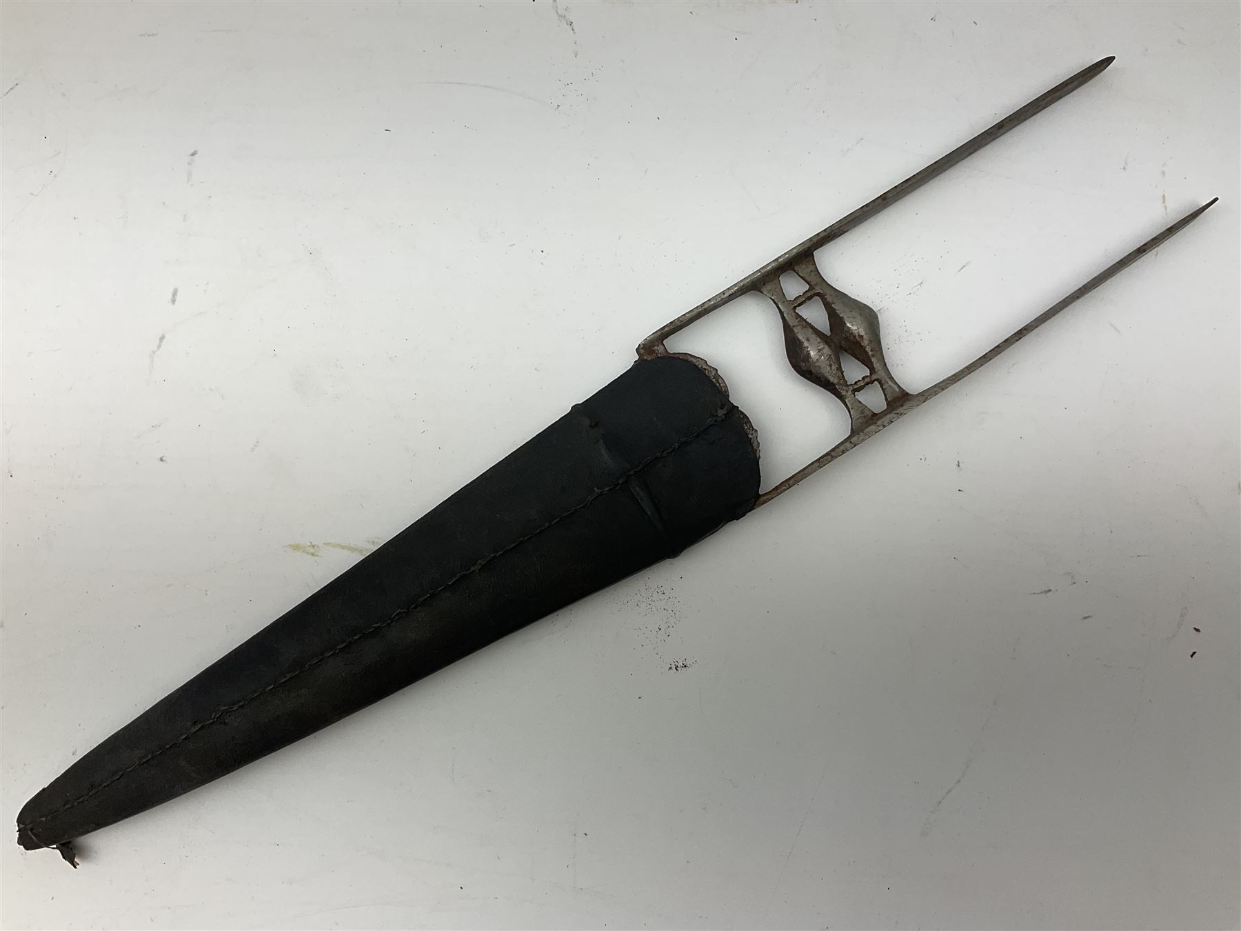 Indian thrusting dagger Katar the 25cm blade with swollen point and central rib, in leather covered wooden sheath L45cm overall