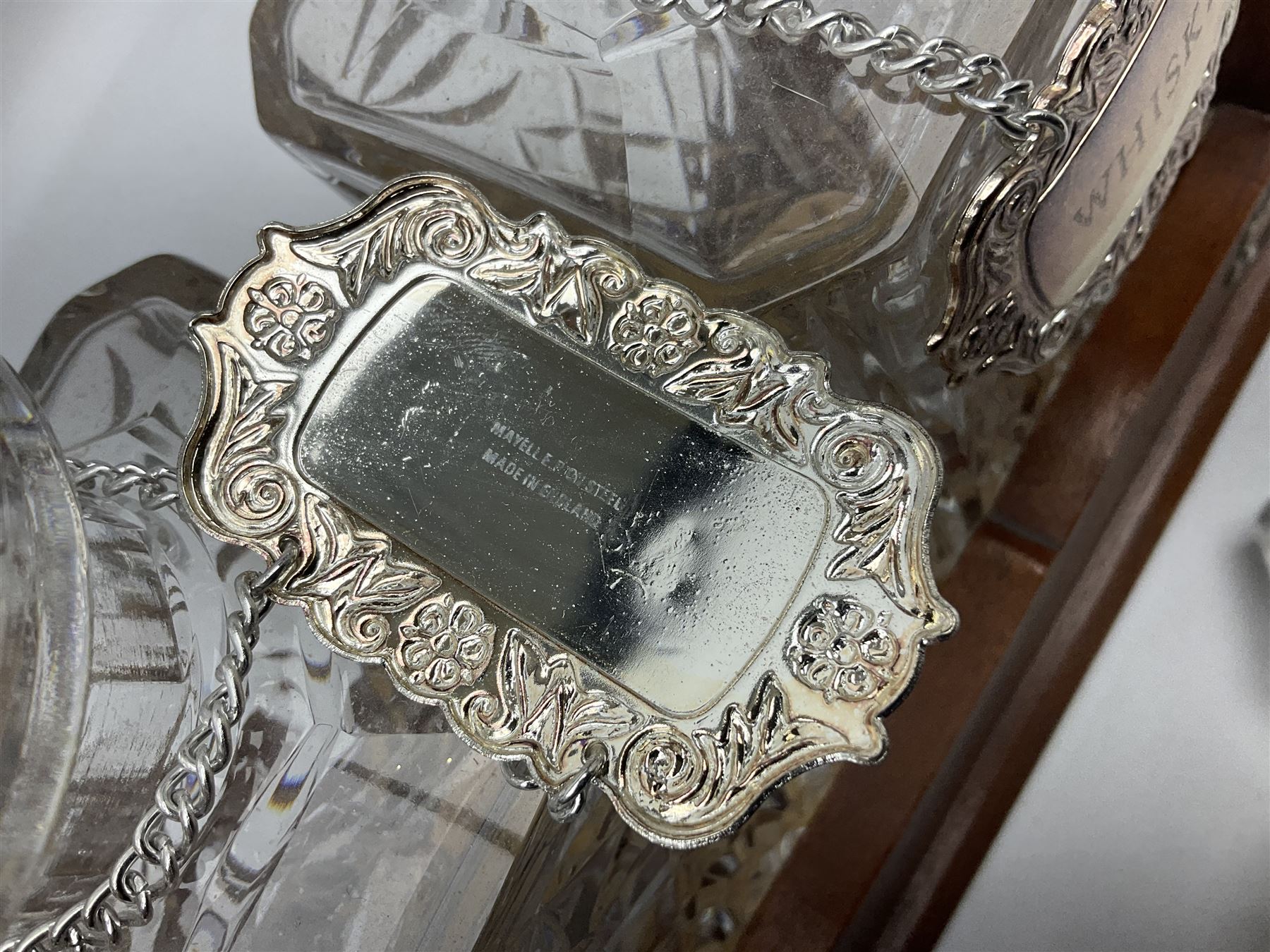Edwardian silver plate mounted oak tantalus, containing three square sided cut glass decanters, complete with key, H33cm