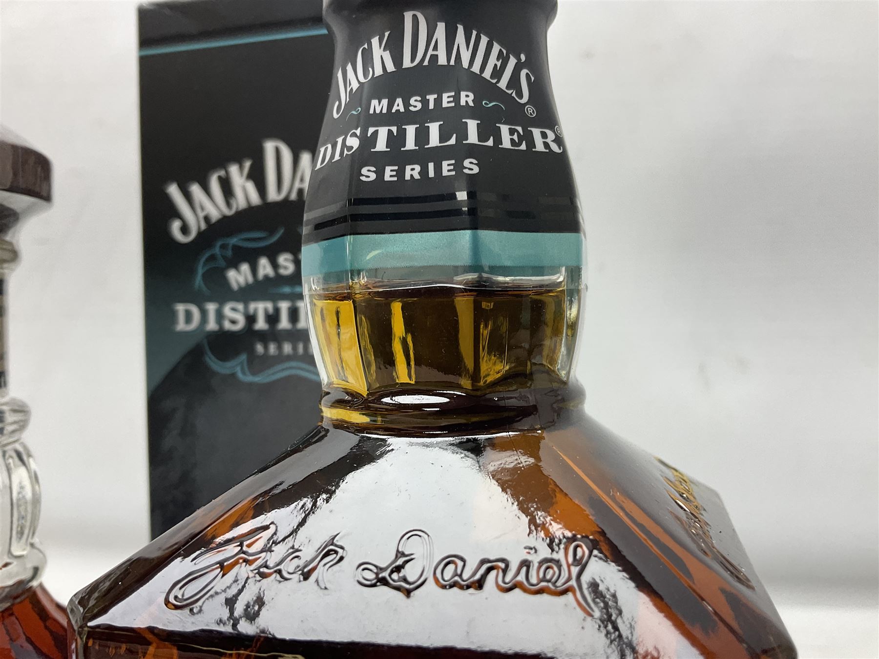 Jack Daniels, single barrel Tennessee whisky, 700ml, 45% vol, Jack Daniels, Tennessee whiskey master distiller series No.4, 700ml, 43% vol, and Courvoisier VSOP cognac, 70cl, 40% vol (3)