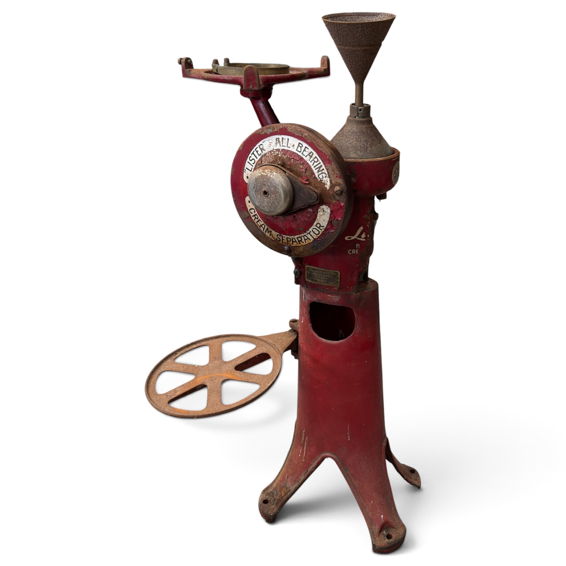 Two early 20th century dairy equipment items: Waide & Sons, Leeds – oak barrel butter churn with iron bands, later converted to electric operation, on trestle stand (W71cm H115cm); Lister – ‘Ball Bearing’ cast iron cream separator, with hopper and foot pedal, in red-painted finish (W47cm H49cm)