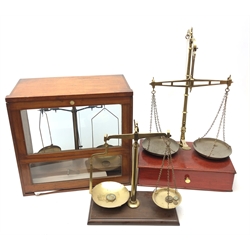  W&T Avery brass balance scale on mahogany base with single drawer, another set of balance scales with weights and a cased set of chemical balance scales by Reynolds & Branson (3)  