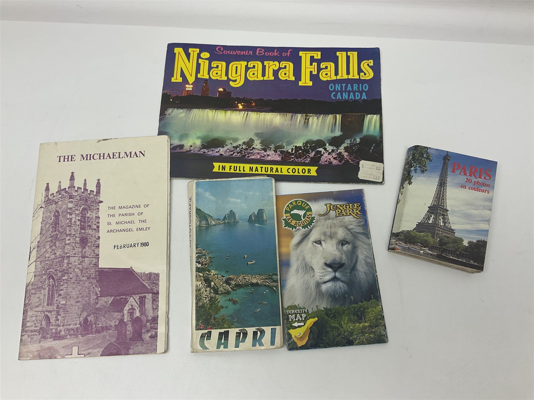 Seven pen knives, two lighters, including one Ronson example and a collection of postcards