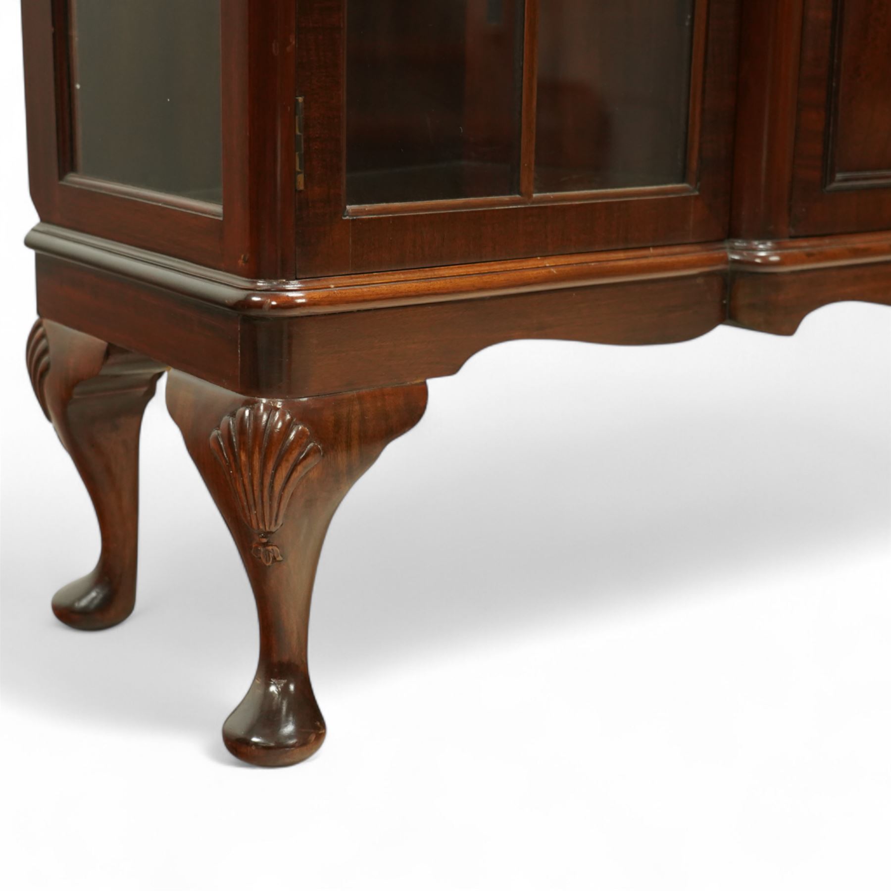 Early 20th-century mahogany glazed side cabinet, rectangular top with moulded edge above central panelled cupboard door enclosing three shelves flanked by two astragal glazed doors enclosing two glass shelves 