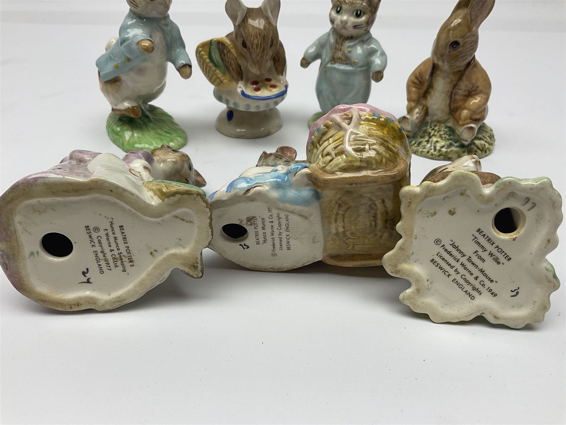Seven Beswick Beatrix Potter figures, including Hunca Munca, Appley Dapply and Timmy Willie