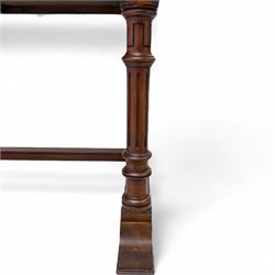 Late Victorian mahogany side table in the style of Gillows of Lancaster, mahogany rectangular top above two frieze drawers, the top edge of the right drawer stamped 'Gillow' and 'L486' with knob handles supported on turned stop and fluted legs with stretcher base on recessed castors

Provenance: The Davies-Cooke Collection from Gwysaney Hall, North Wales  