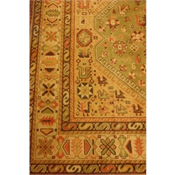  Persian Heriz design green ground rug carpet, triple lozenge pole medallion, stylised bird motifs, 350cm x 262cm  