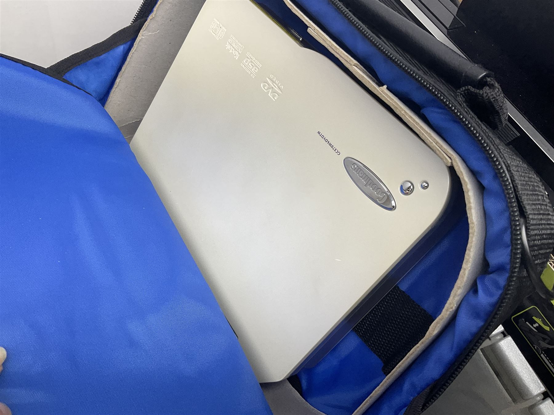 Singer 66 sewing machine in wooden case, together with an LG DVD player with speakers, two portable DVD players, etc 