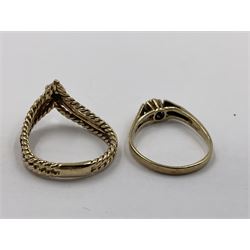 Four 9ct gold rings, to include cubic zirconia wishbone ring, single stone cubic zirconia ring and two heart design signet rings