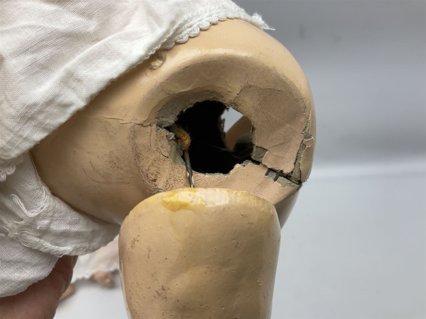 Heubach Koppelsdorf Germany bisque head doll with applied hair, sleeping eyes, open mouth with teeth and composition body with jointed limbs; marked 'Heubach Koppelsdorf 342.6/0 Germany' H34cm; Armand Marseille bisque head baby doll with moulded hair, sleeping eyes, open mouth and composition body with jointed limbs; marked 'A.M. Germany 351./8.K.; and BND London all composition doll (3)